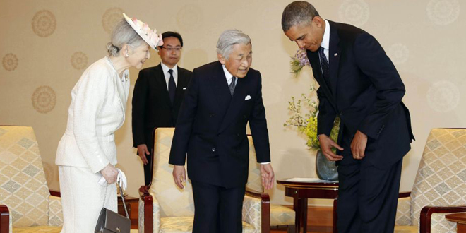 Obama Towers over Japanese Emperor in Tokyo